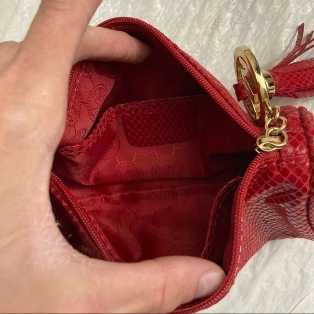 Michael kors red snake embossed cosmetic bag or clutch tassel
